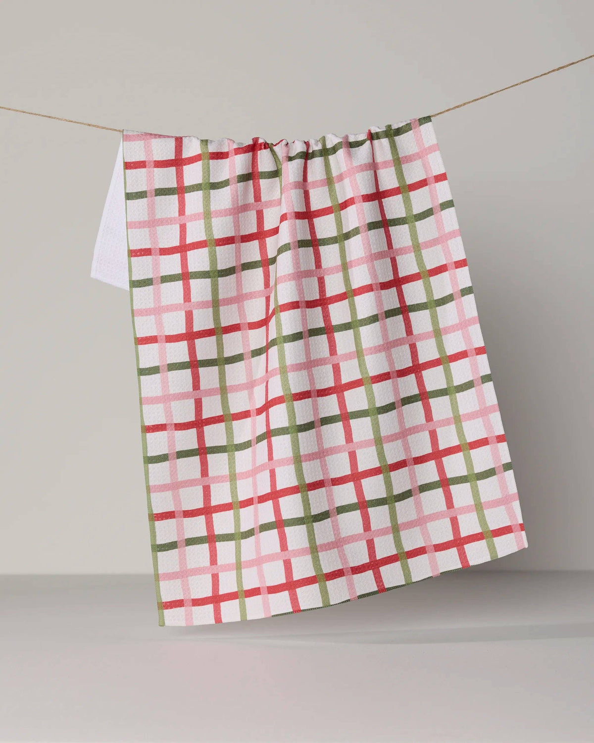Festive Plaid Tea Towel by Geometry